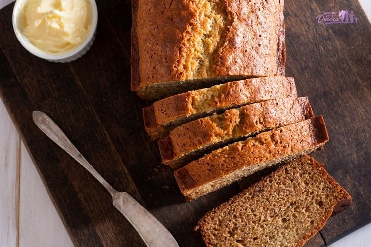 This Bread Recipe Without Brown Sugar is so soft and moist! Once you try this, it'll become your go-to to use ripe bananas. It's so simple and it's a great nut-free recipe. 