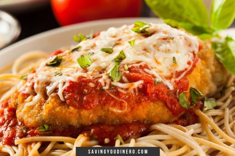 You must try this easy chicken parmesan recipe. It has a deliciously crispy coating, smothered tomato sauce, and melted mozzarella cheese!