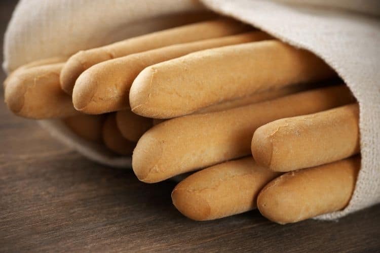 Enjoy Olive Garden at home with this easy recipe for Copycat Olive Garden Breadsticks you can make in your bread machine. 