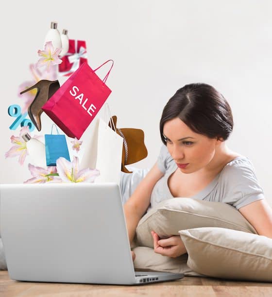Woman shopping online laptop home
