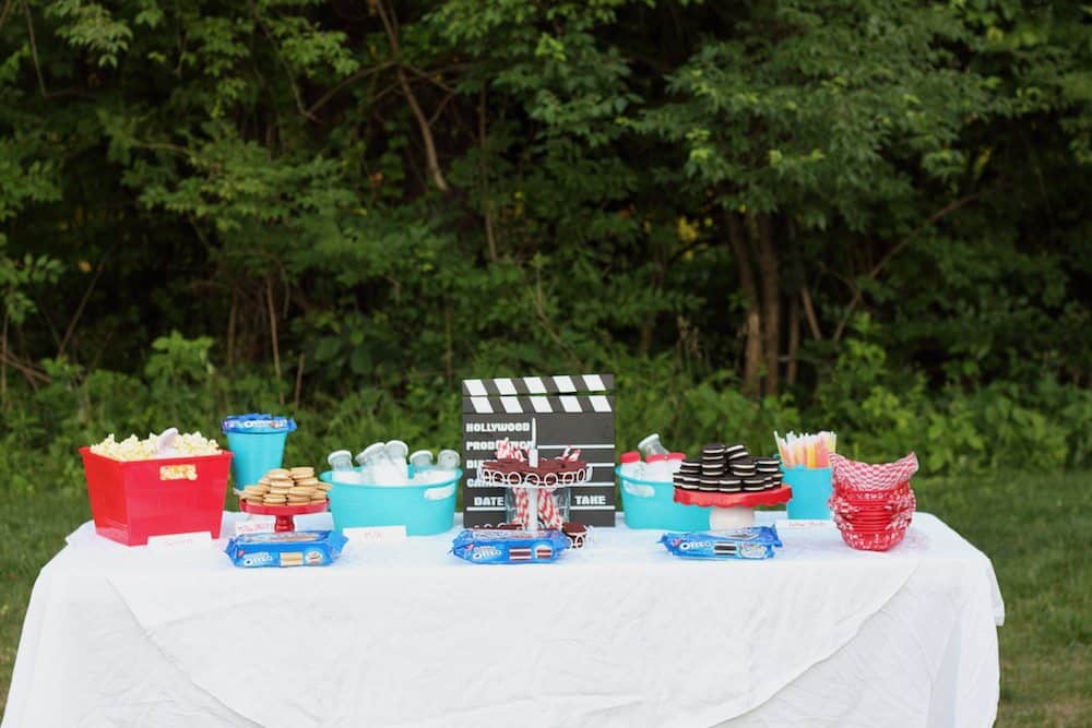 How To Plan The Perfect Outdoor Movie Night Check out these tips to plan the perfect outdoor movie night with popcorn, cookies, and milk. Plus a few things to make it even more fun!