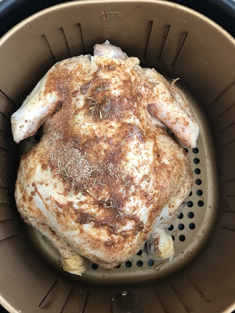 This recipe for Air Fryer Whole Chicken is so easy and flavorful. It tastes just like Rotisserie chicken, and it's so easy!