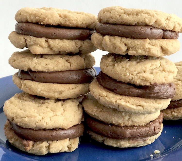 You must make these Peanut Butter Sandwich Cookies With A Chocolate Filling . They are sorta like peanut butter kiss cookies with out worrying about not having a bite of cookie without the chocolate. Or you could say they are like the cookie version of a peanut butter cup.