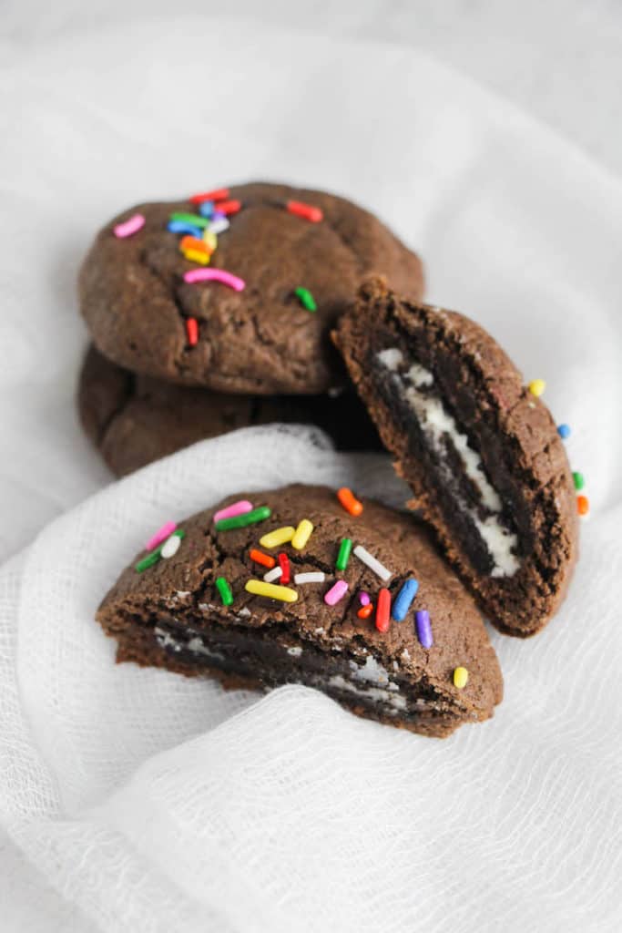 Are you looking for an easy and delicious cookie recipe? You have to try this Chocolate OREO-Stuffed Cookies Recipe. I love to make cake mix cookies - and these cookies start with a chocolate cake mix. But you could switch it out for a strawberry, vanilla, or red velvet cake mix. 