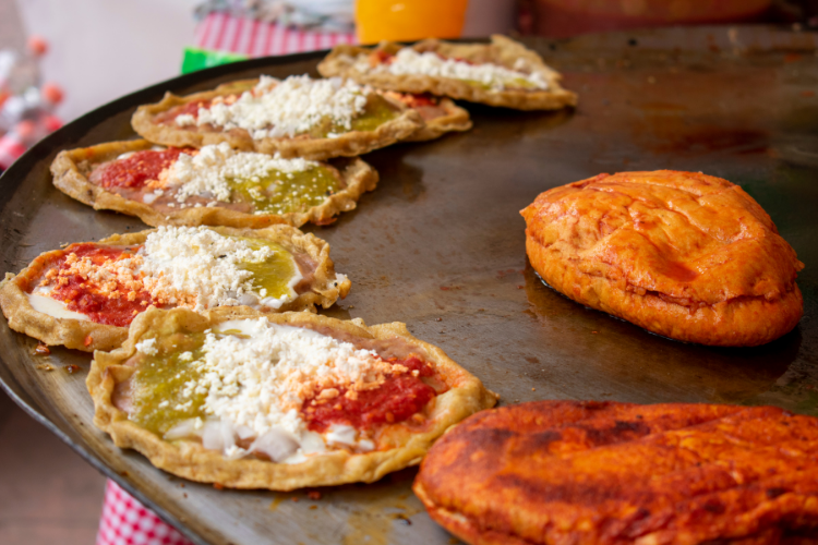 Check out this Pambazos Recipe! It's a yummy Mexican Potato & Chorizo sandwich that is topped with a salsa, queso fresco, lettuce and creama. It has lots of flavors. They are easy to make and great for a party.
