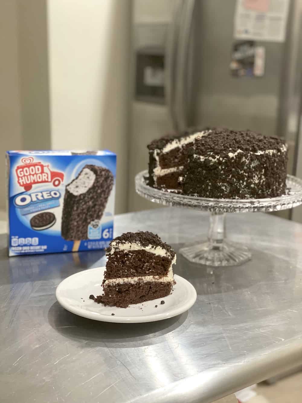 You will love this Chocolate Oreo Cake Recipe! It's a moist chocolate cake covered in vanilla buttercream and chocolate crumbles!