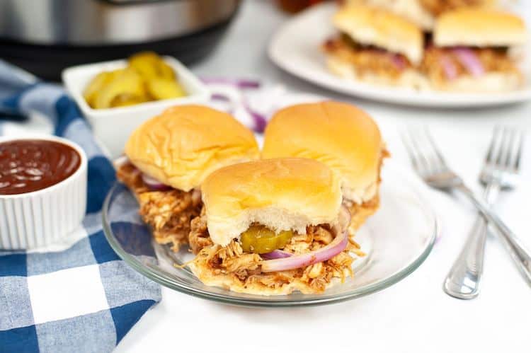 Need a quick dinner recipe? Check out this recipe for Instant pot pulled BBQ chicken sliders. Add a salad and fruit for a fun meal! Make this in the Instant pot with fresh or frozen chicken. 