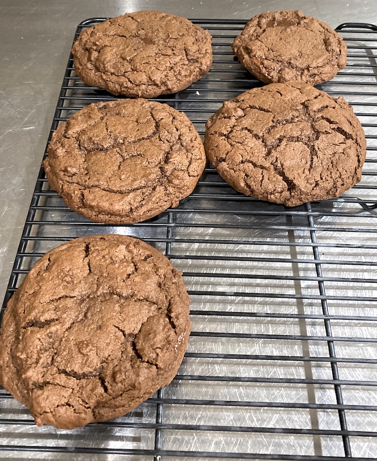 Check out this recipe for chocolate lava cookies! These giant chocolate cookies are so good and filled with hot fudge! They are huge cookies and they have a soft fudge filling! They are like a copy cat of Crumbl cookies.
