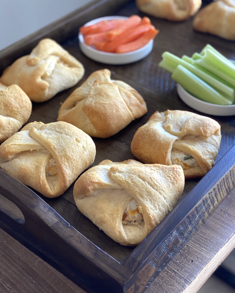 With simple ingredients like chicken, crescent roll dough, cheese, and spices you have a filling meal or a popular appetizer to share. It is sure to become a family favorite.