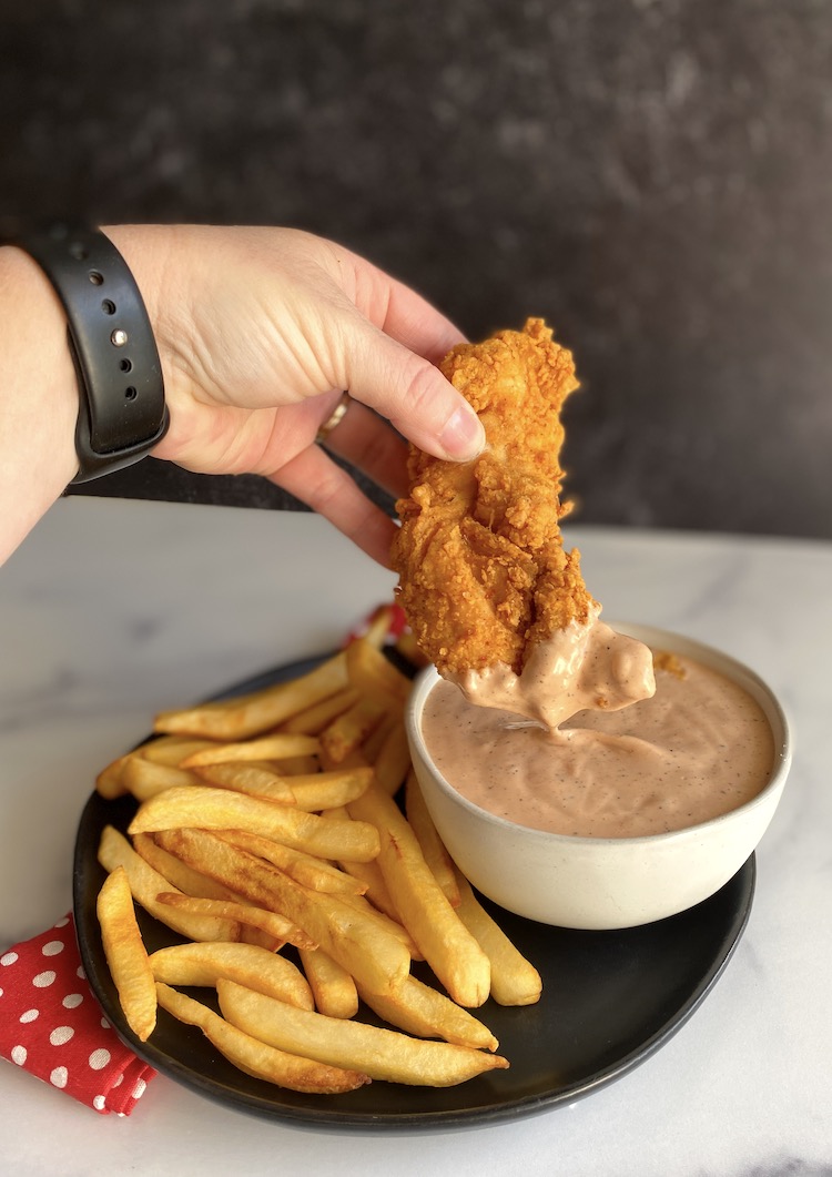 Copycat Raising Cane's Sauce Recipe - With common ingredients and delicious flavor, this Cane's Sauce recipe will be the only dipping sauce your family will ask for when eating chicken and fries.