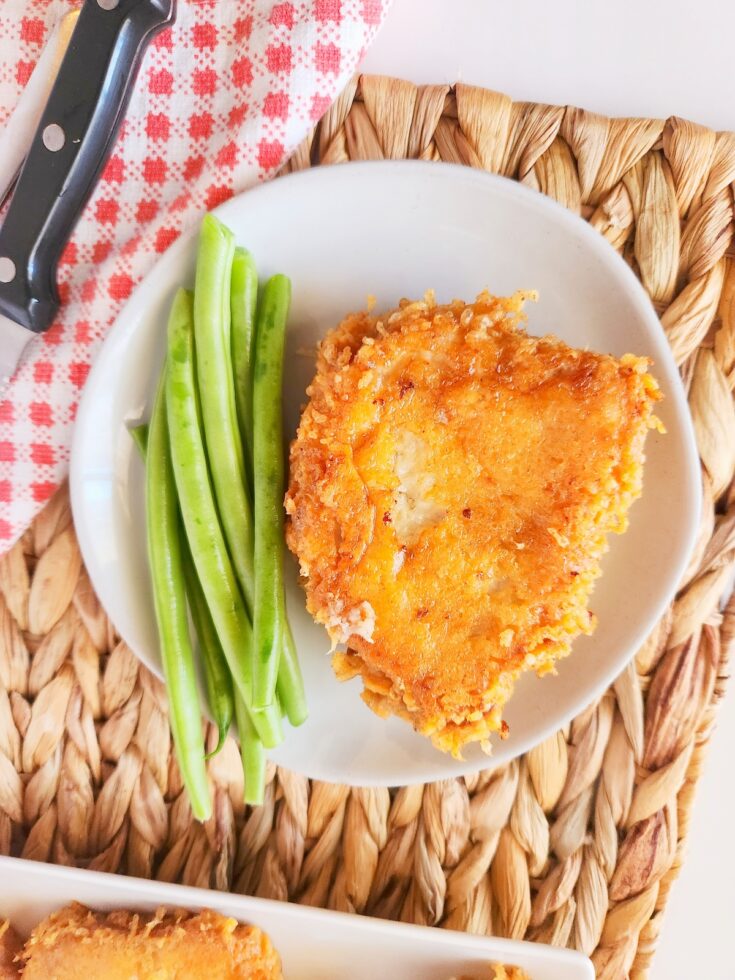This recipe for Parmesan Crusted Pork Chops is so easy and delicious. The parmesan cheese gives it so much flavor and a crispy crust.