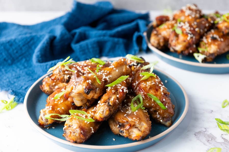 These Asian Sticky Chicken Wings are crispy, sweet, savory, and perfectly glazed with a honey soy garlic sauce. The ultimate appetizer or game-day snack!