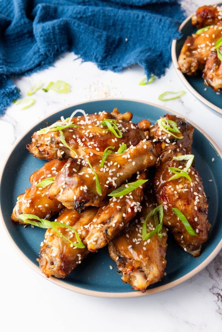 These Asian Sticky Chicken Wings are crispy, sweet, savory, and perfectly glazed with a honey soy garlic sauce. The ultimate appetizer or game-day snack!