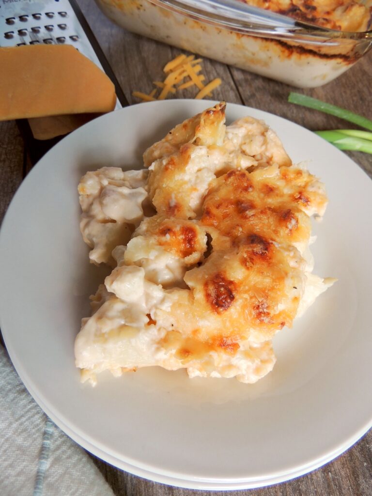 This keto cauliflower casserole is creamy, cheesy, and baked to golden perfection! Made with fresh cauliflower florets, cream cheese, sharp cheddar cheese, and heavy cream, it’s a low-carb dinner or side dish the whole family will love. Perfect for busy weeknights, low-carb diets, or ketogenic diets, this cheesy cauliflower casserole recipe is freezer-friendly and easy to make with simple ingredients.