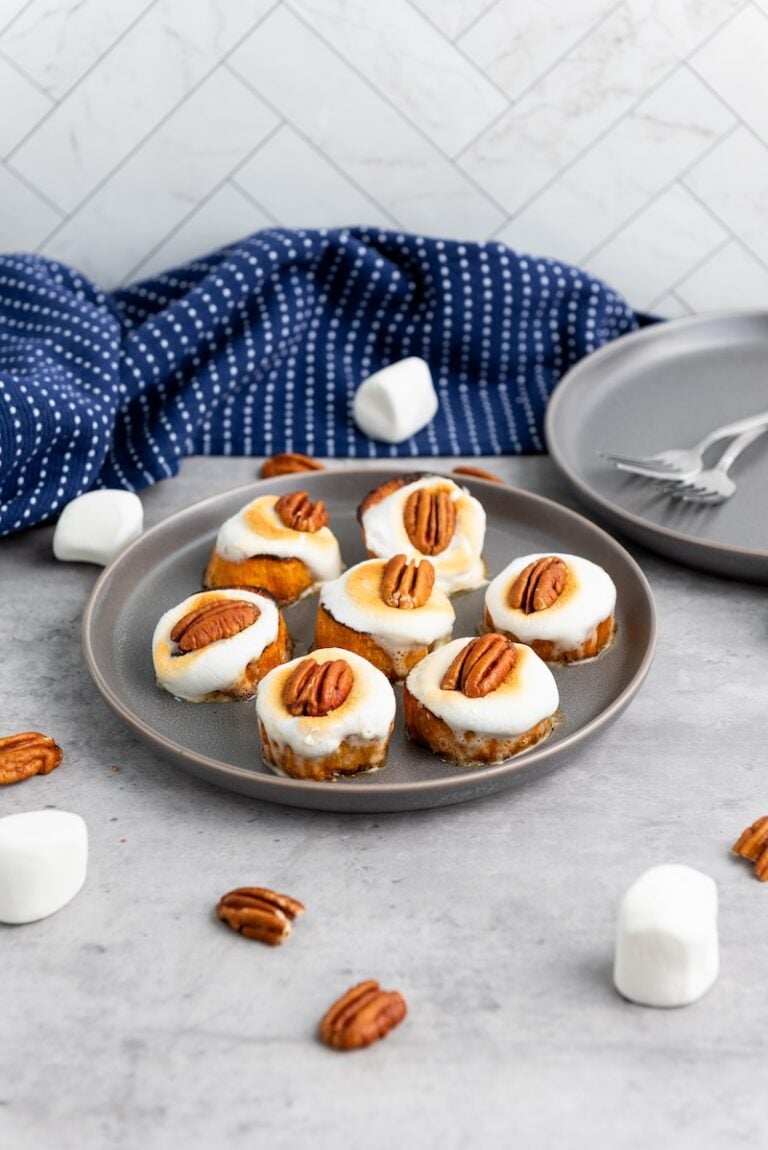 Easy sweet potato bites made with toasted marshmallows and pecans. The perfect holiday appetizer will be your favorite sweet potato recipes.