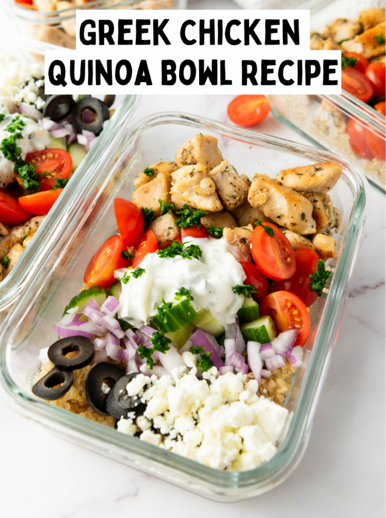A glass meal prep container filled with a Greek Chicken Quinoa Bowl topped with tzatziki and feta.