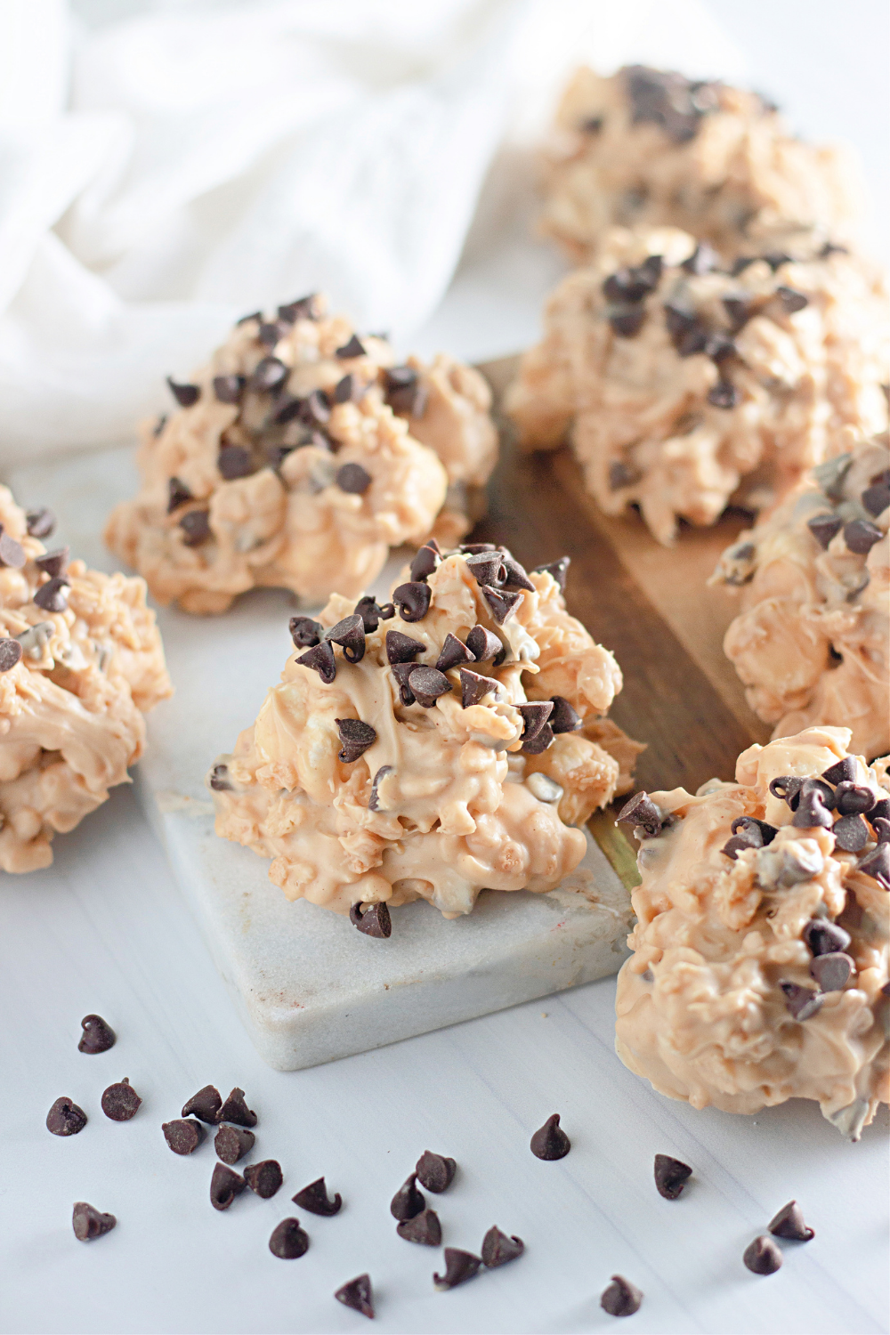 Homemade Avalanche Cookies with white chocolate, peanut butter, Rice Krispies cereal, and mini chocolate chips.